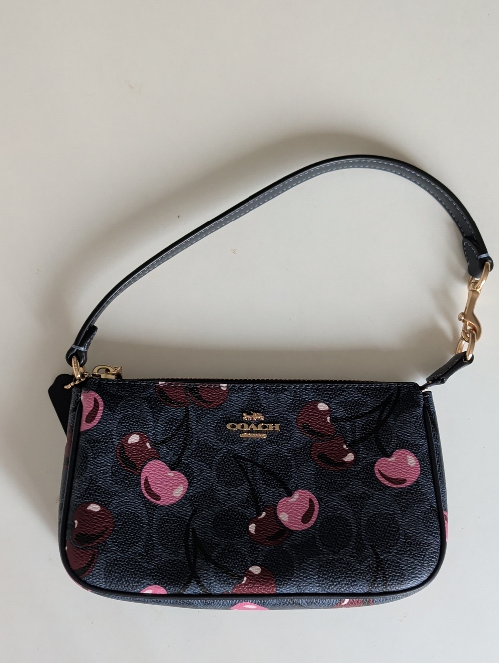 Coach Navy Cherry Print Wristlet with Pink Accents